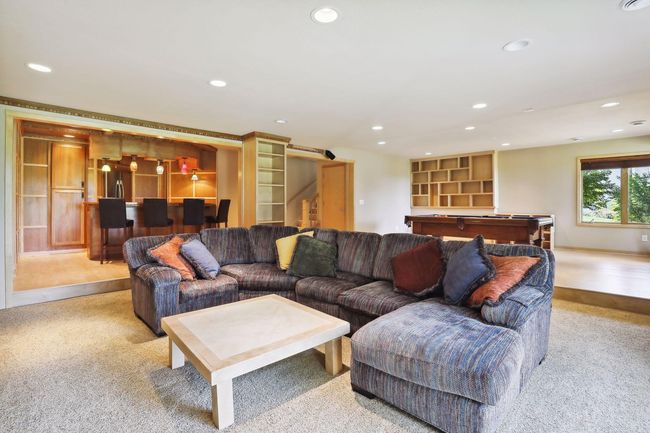 Entertainment delight, bar and amusement space, walk out to private lake setting. What more could you want? | Image 36