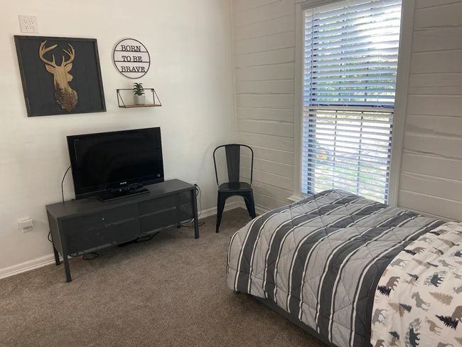 View of carpeted bedroom | Image 18