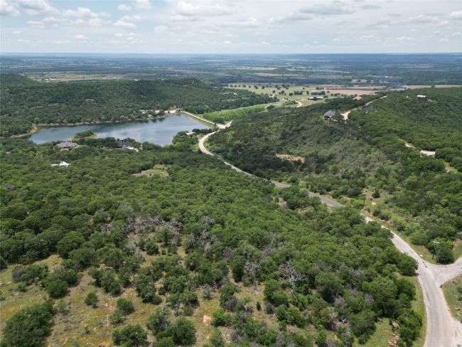 Aerial view with a wooded view and a water view | Image 16