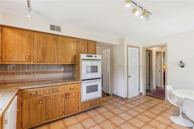 Granite counters, double ovens. | Image 11