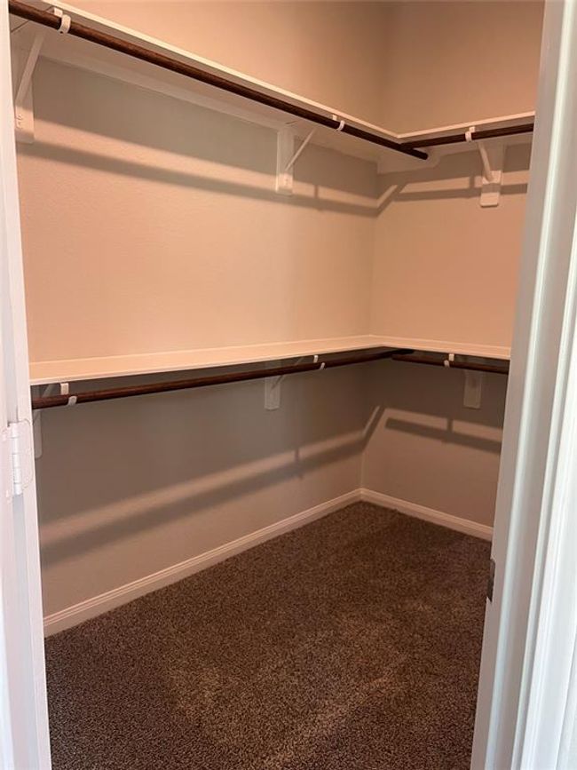 Walk in closet in the master room. | Image 14