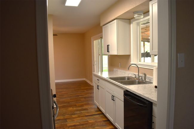 All new kitchen cupboards in kitchen with new faucets, etc. | Image 12