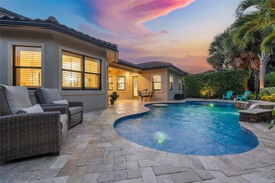 Anyone for a nightime dip and a cocktail in our heated pool with LED remote changeable lighting? | Image 3