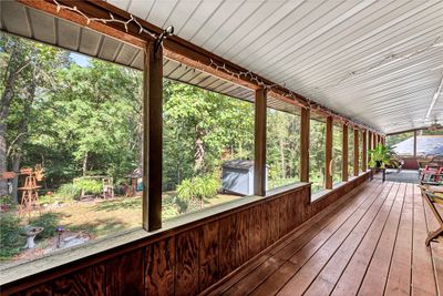 covered and screened back deck | Image 3