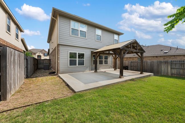 Back of house with a gazebo, cooling unit, and a patio | Image 32