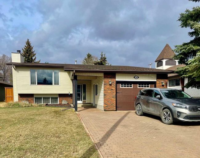 518 5 Avenue, Home with 4 bedrooms, 2 bathrooms and 3 parking in Wainwright AB | Image 1