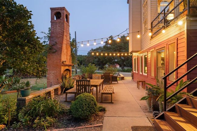 One of many outdoor entertaining spaces. This location is perfect for cool evenings surrounded by family and friends. | Image 26