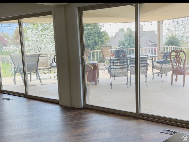 Entryway featuring wood finished floors and visible vents | Image 16