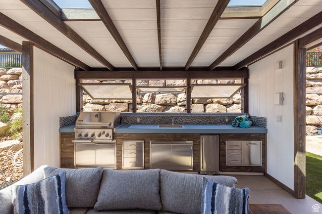 View of patio featuring area for grilling and a sink | Image 20
