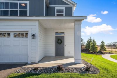 The front entry was smartly designed with a nice covered porch feel. | Image 3