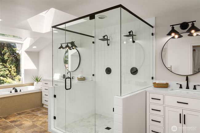 Talk about a shower luxury — a rainfall experience in your designer-tiled walk-in oasis. | Image 18