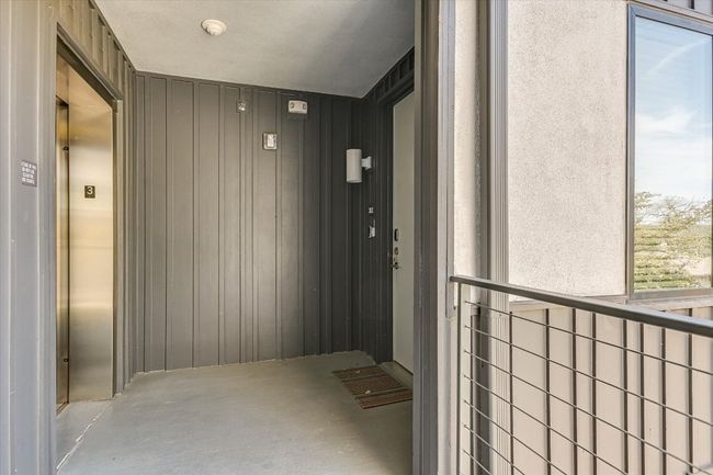Doorway on right side is directly across from the elevator. | Image 22