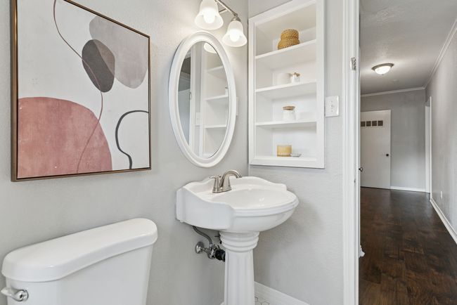 We love the built-in shelves by the sink! | Image 25
