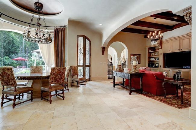 Breakfast area and den off of the kitchen. This a great home for entertaining. | Image 16