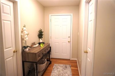 Doorway to outside with dark hardwood / wood-style flooring | Image 2