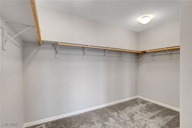 Spacious closet featuring carpet floors | Image 47