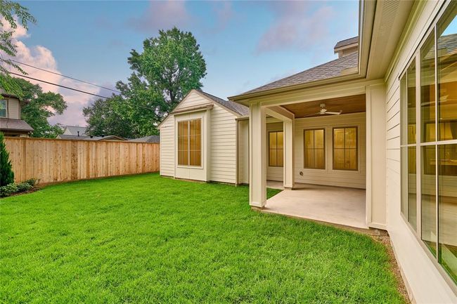 Beautiful Zoysia grass adds lush charm to the spacious backyard, providing ample room for outdoor activities , entertaining, or simply enjoying the open air! | Image 44