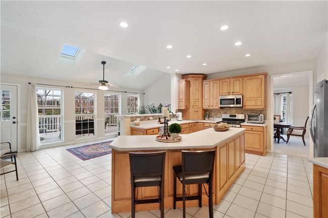 Open and airy kitchen that opens to the great room and morning room making entertaining a breeze. | Image 8