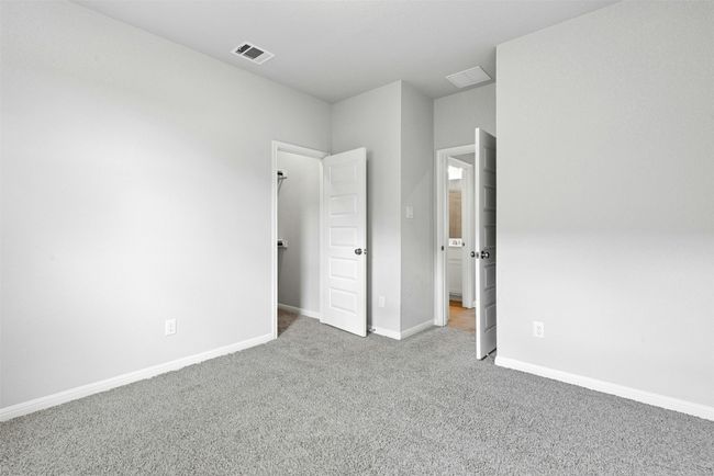 Unfurnished bedroom with carpet and baseboards | Image 35