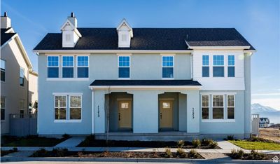 View of front of home with a mountain view and covered porch | Image 1