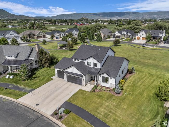Aerial perspective of suburban area featuring a mountainous background | Image 53