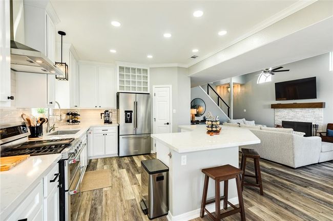 Luxury vinyl plank flooring is throughout the home | Image 15