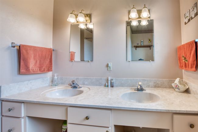 Full bathroom featuring double vanity | Image 44