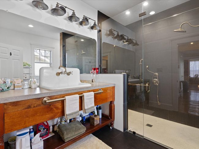 Full bath with vanity, a shower stall, recessed lighting, and tile patterned floors | Image 18