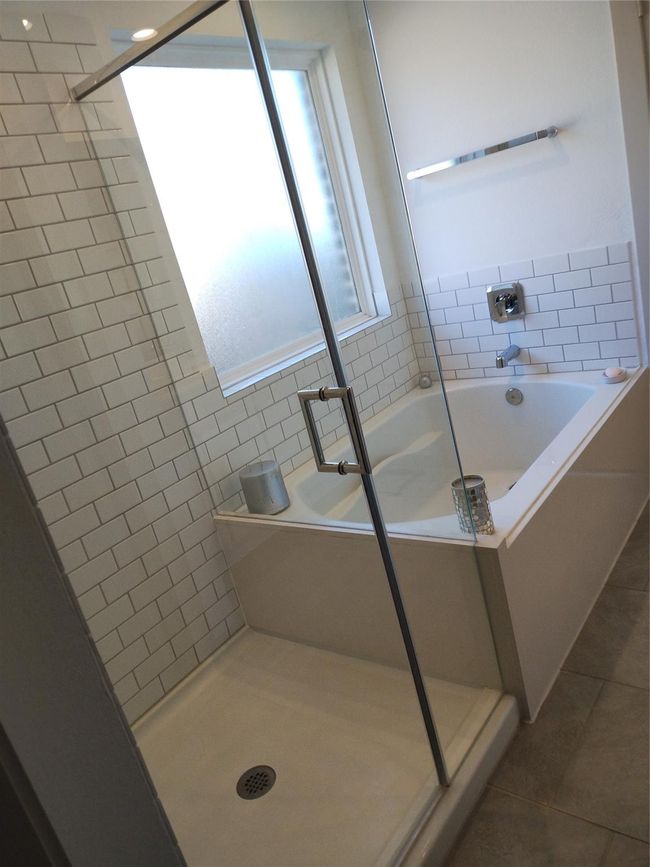 Primary bath with seamless shower and separate tub | Image 8