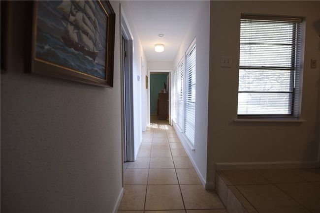 Hallway to 2 of the Downstairs Bedrooms and 1 Bathroom | Image 30