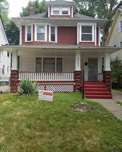 View of front of house with a front lawn and covered porch | Image 1