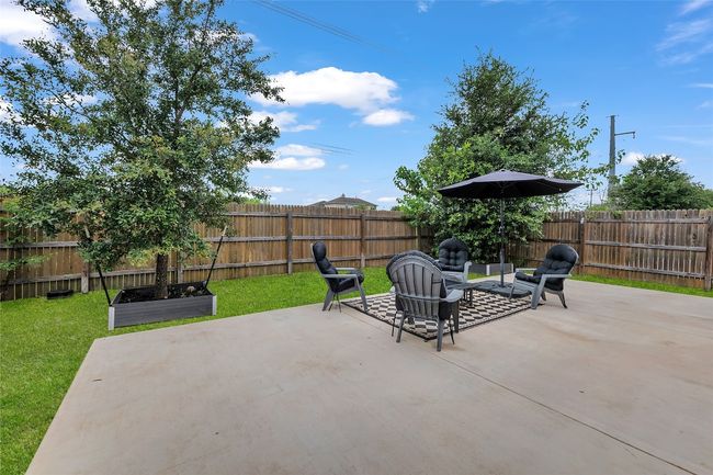 Fenced backyard featuring a patio area | Image 27