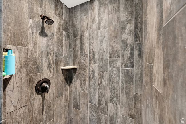 Bathroom view of tiled shower | Image 11