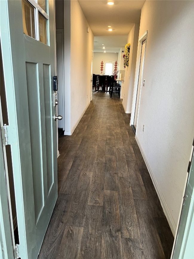 Hallway with baseboards, dark wood finished floors, and recessed lighting | Image 4
