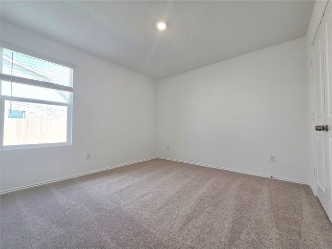 Carpeted empty room with baseboards | Image 31