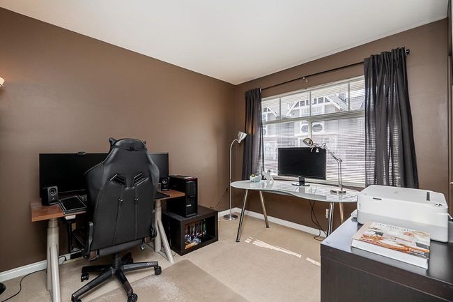 Office space with light carpet and baseboards | Image 18