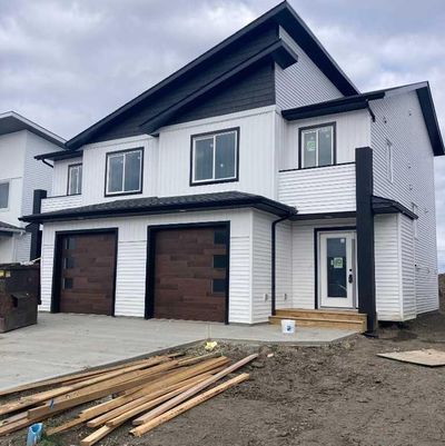 9508 114 Ave, Home with 3 bedrooms, 2 bathrooms and 2 parking in Clairmont AB | Image 1