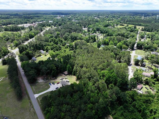 Birds eye view of property featuring a forest view | Image 6