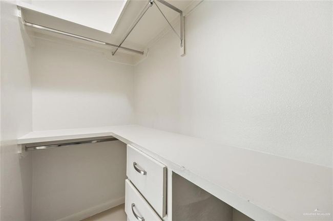 View of walk in closet | Image 6