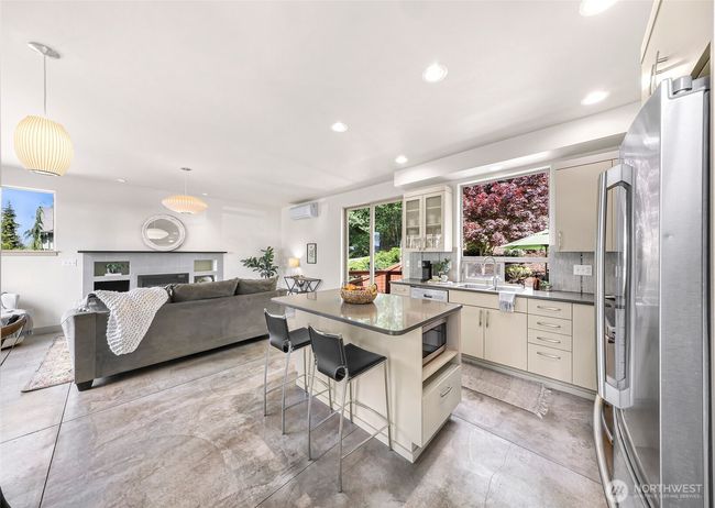 Amazing backyard views over the kitchen sink. Open floor concept, easy entertaining. | Image 5