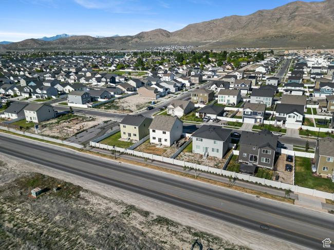Aerial view of property's location with nearby suburban area and mountains | Image 36