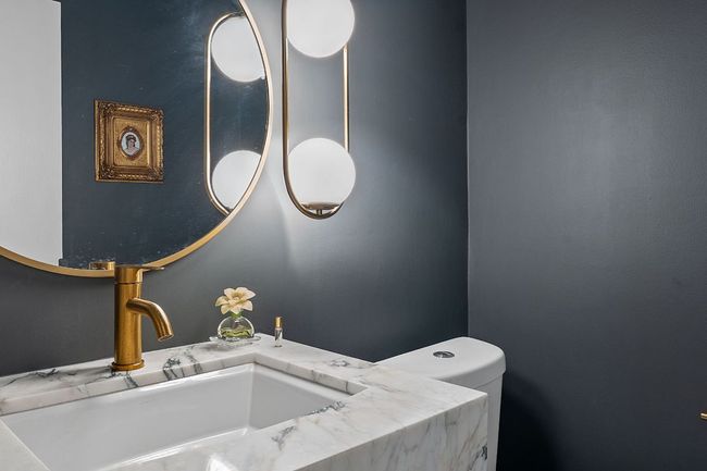 Bathroom with toilet and vanity | Image 27