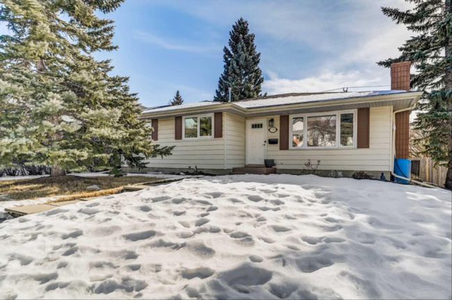 7383 Silver Springs Road Nw, Home with 5 bedrooms, 2 bathrooms and 4 parking in Calgary AB | Image 1