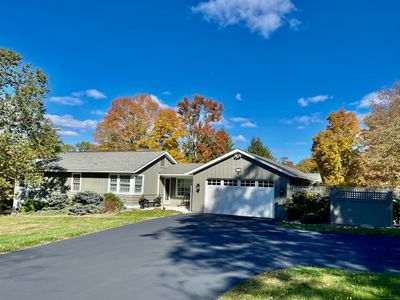 Custom Ranch tucked back on a quiet country road on 3.59 pastoral acres | Image 1