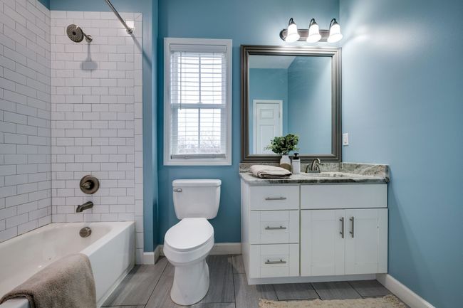 GUEST Bathroom w/ Upgraded Vanity + Tile Surround | Image 30