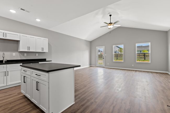 Living room/kitchen view from front of home | Image 11