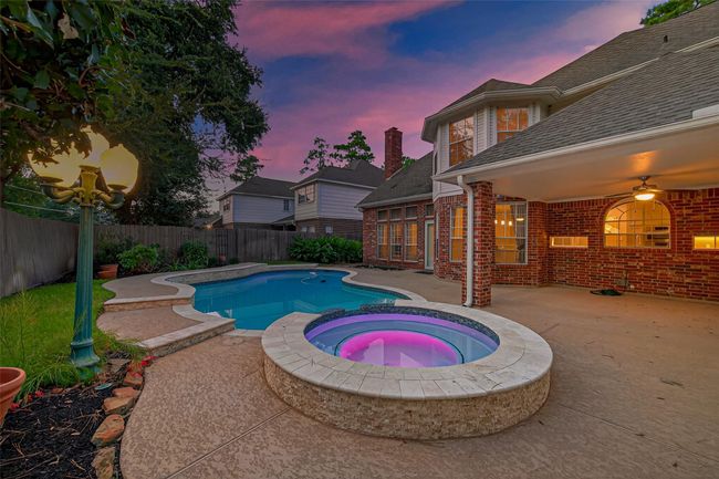 Pool and Spa with recent aesthetic upgrades including tile, coping and water features. | Image 45