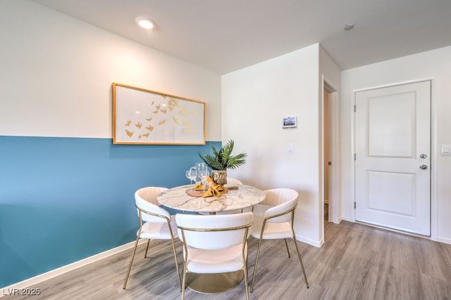 Dining area featuring recessed lighting, wood finished floors, and baseboards | Image 9