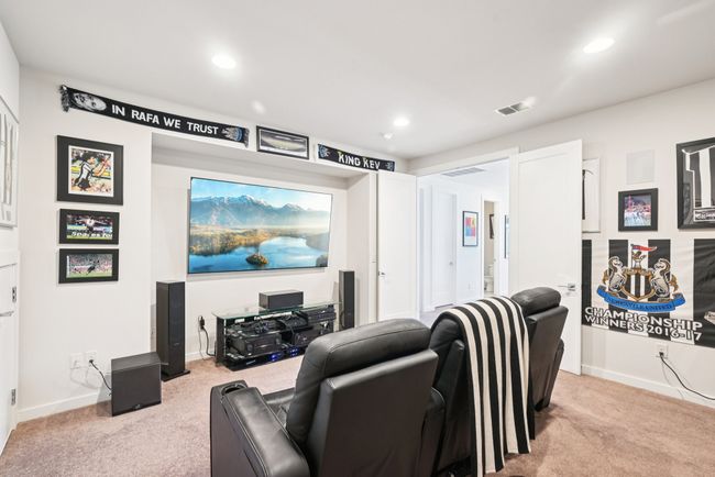 Cinema room with light carpet and recessed lighting | Image 24