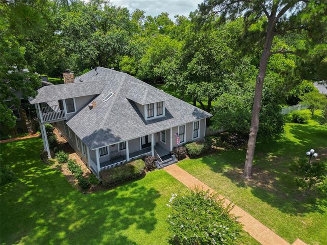 Discover serene wooded views and a charming home on this historic homestead in modern day times | Image 49